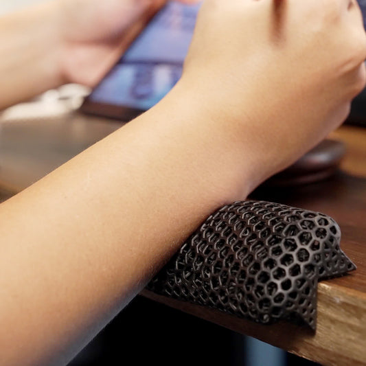 Bublepik Sleek Black Wave desk edge rest angled view